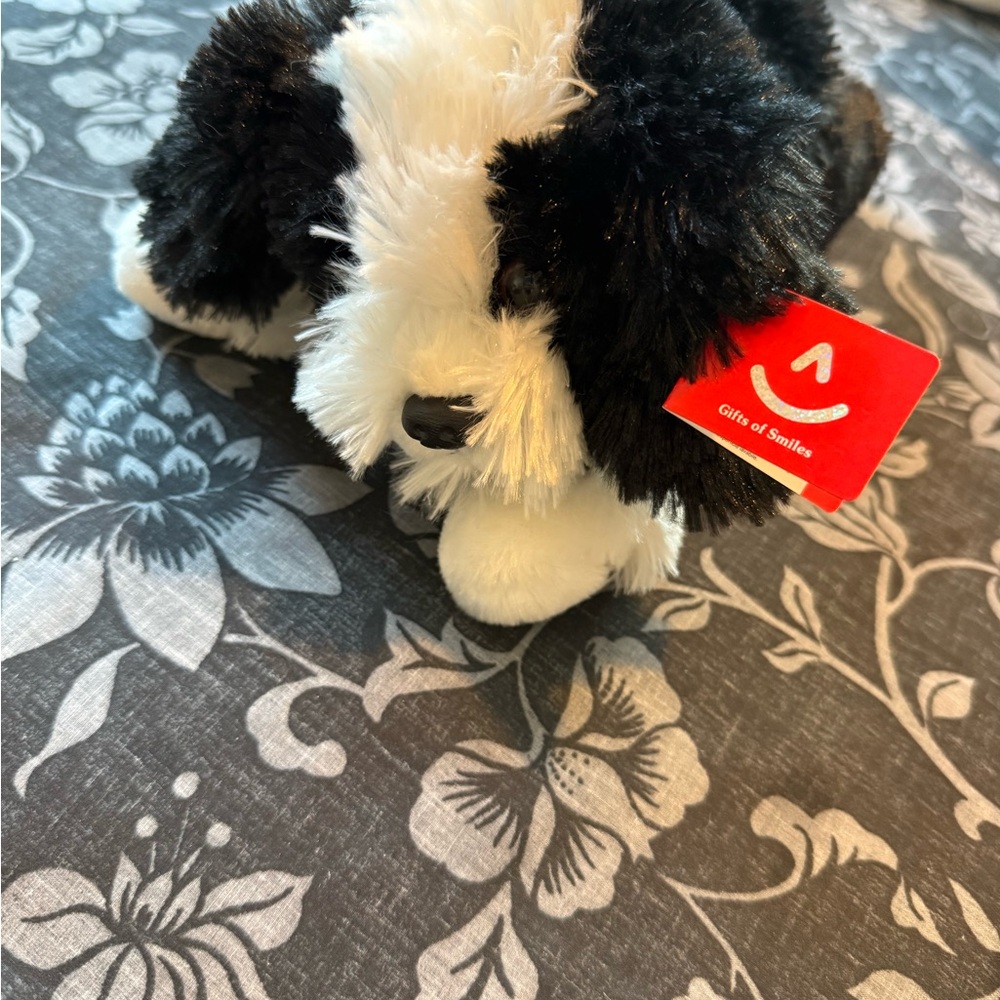 Black and White Plush Dog by Aurora